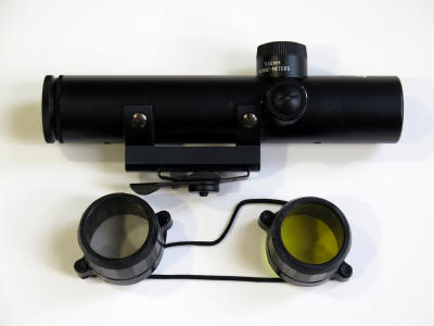 Colt 4x21 above with lens covers