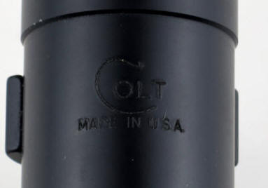 Reflex engraved "Colt / Made in USA" logo on top of scope