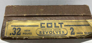 Yellowed Colt revolver data labels-1