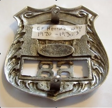 George F. Herold Gun Shop police badge